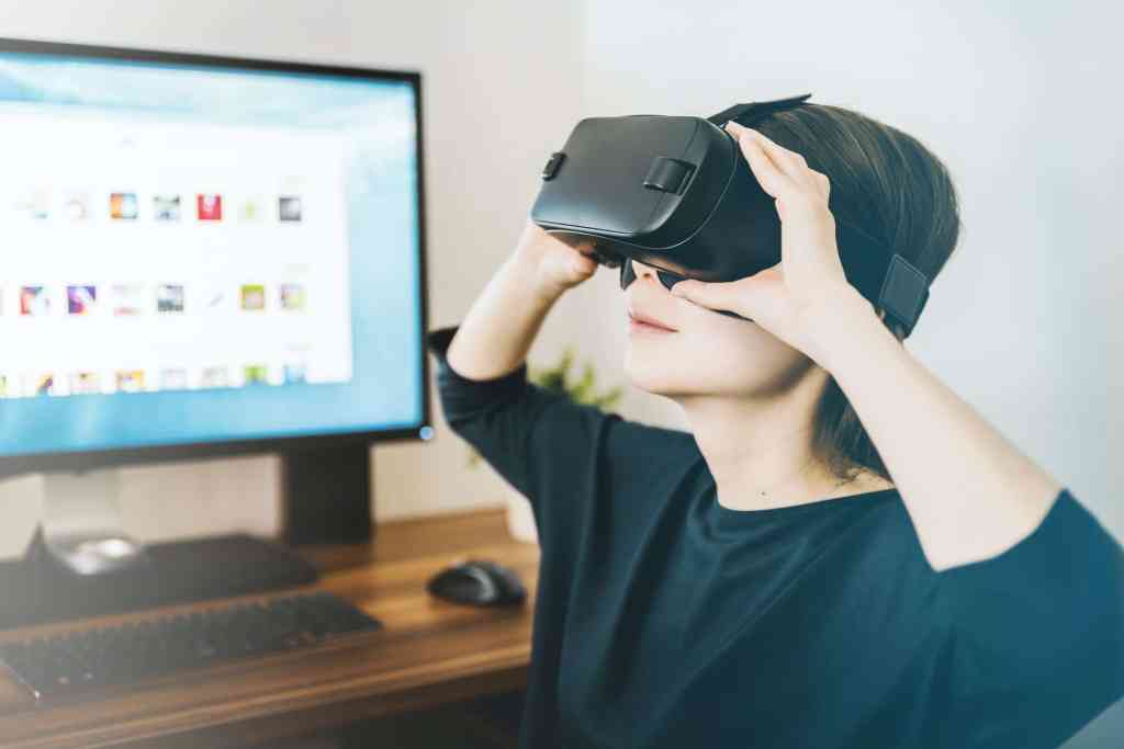 woman with virtual reality headset metaverse