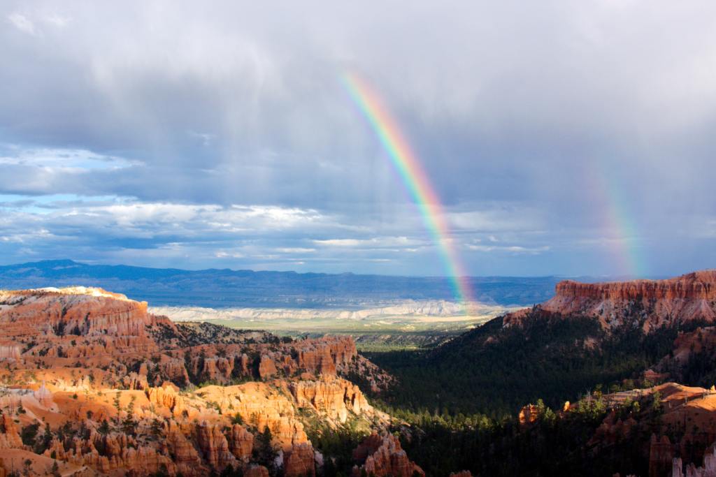 Double rainbow over mountains