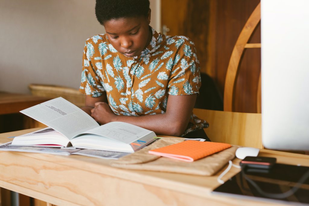 female student reviewing study notes