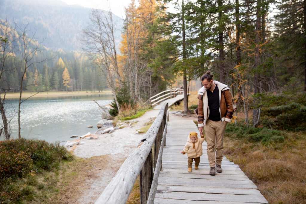 4 Day Work Week Father enjoying free time with child in nature